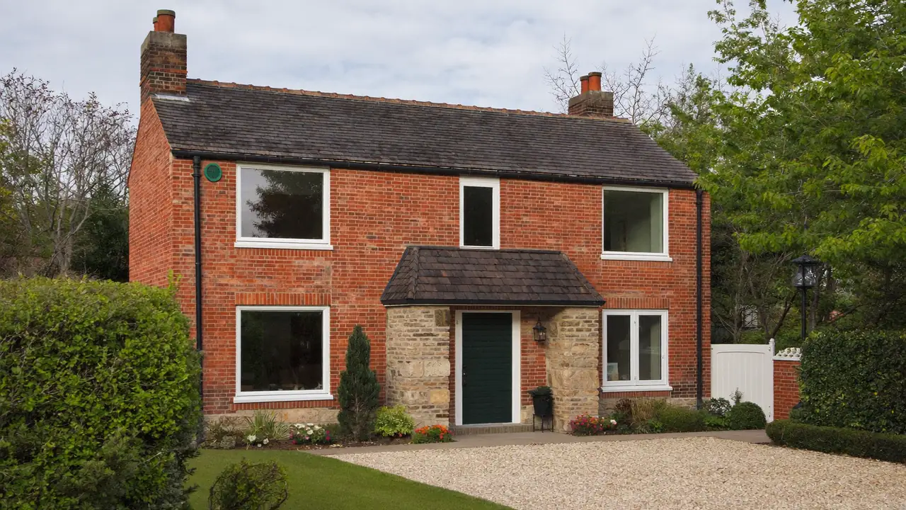Semi-detached house with newly fitted white casement windows